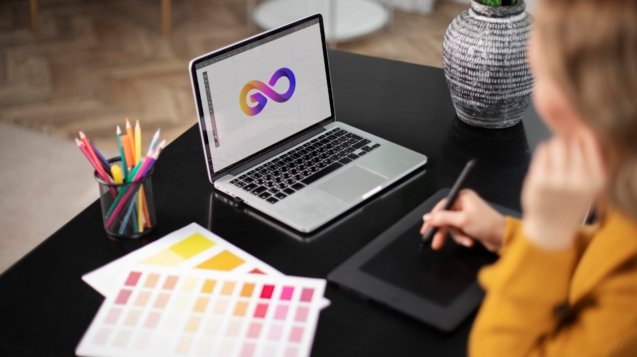 female-logo-designer-working-her-tablet-connected-laptop